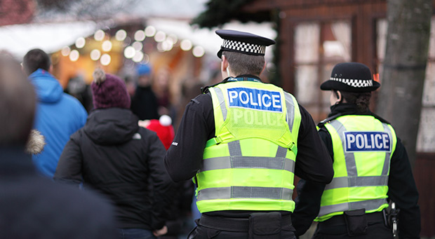 Police officers in crowd