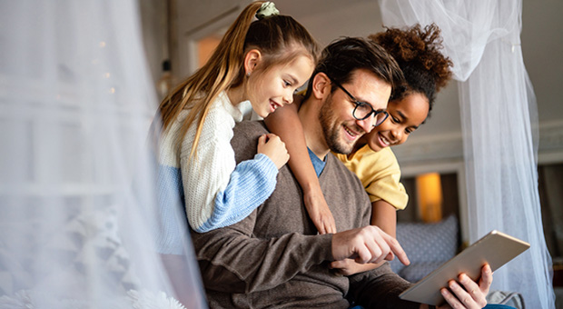 Dad with daughter and a kinship care girl