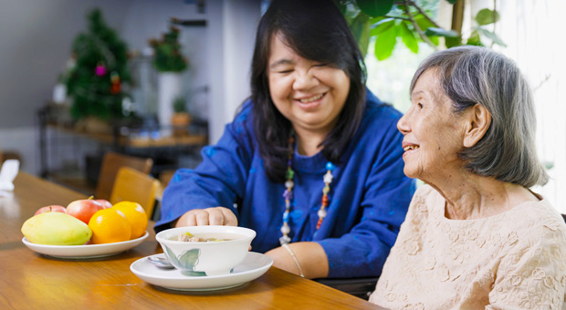 two women sharing a meal together