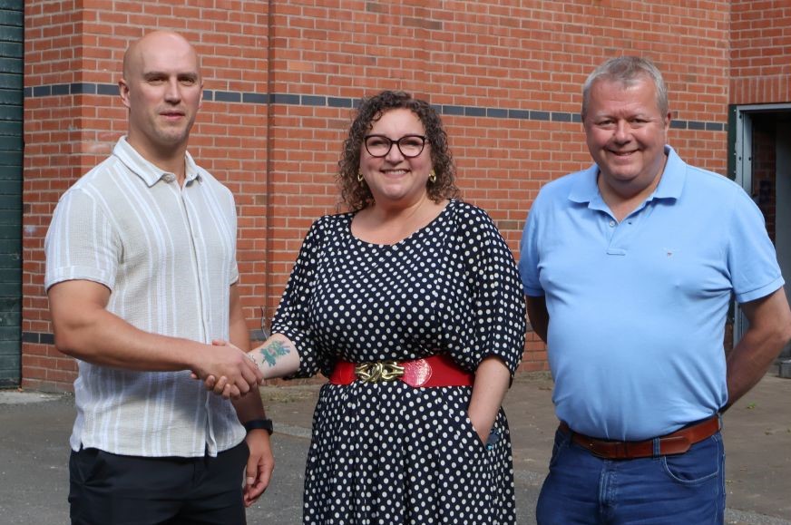 Damien Walters, Councillor Nadine Peatfield and Russell Rigby at the Aida factory