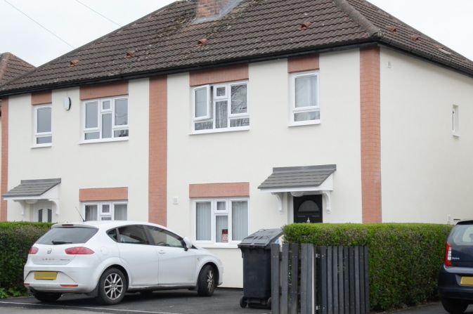 White two-story house.