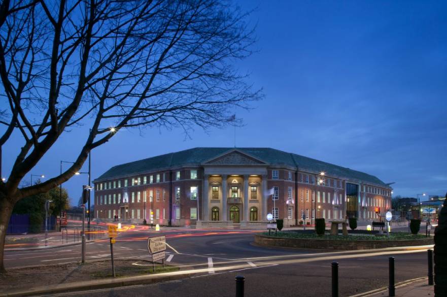 Council house exterior at night