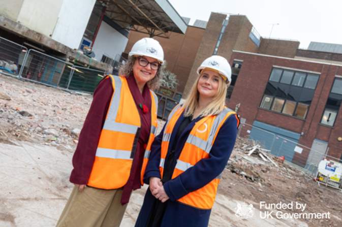 Beth Macdonald and Cllr Peatfield stood at the Eastern Gateway site