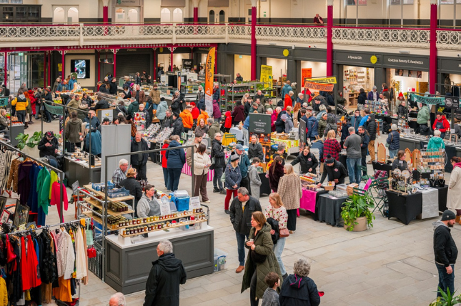 Crowds of shoppers peruse the stalls at inside Derby Market Hall