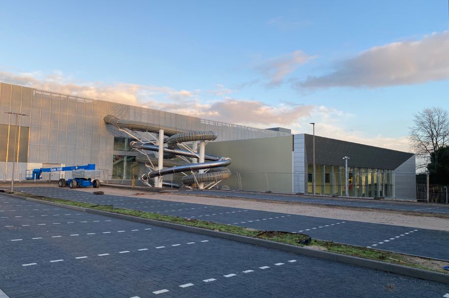 Exterior of Moorways Sports Village with flumes