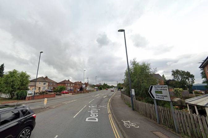 Two-way road with turn right line and shared use path