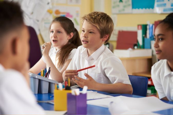 School pupils sitting at their desks