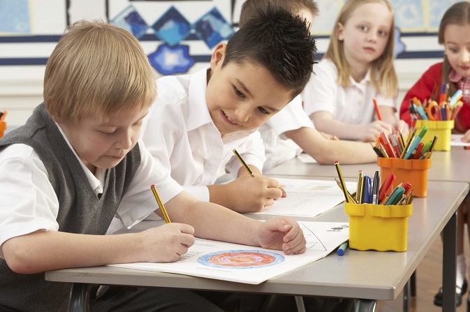 children sitting in a school classroom