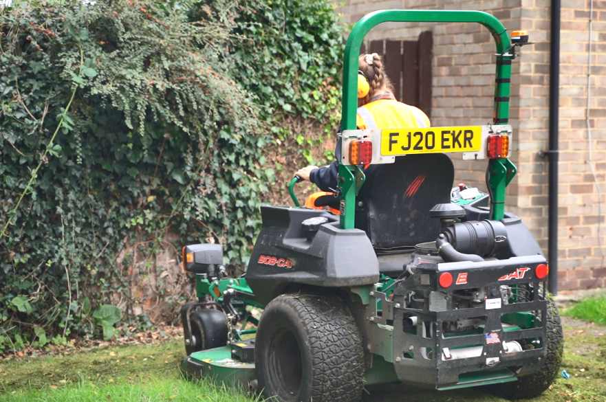 Ground maintenance team grass cutting 