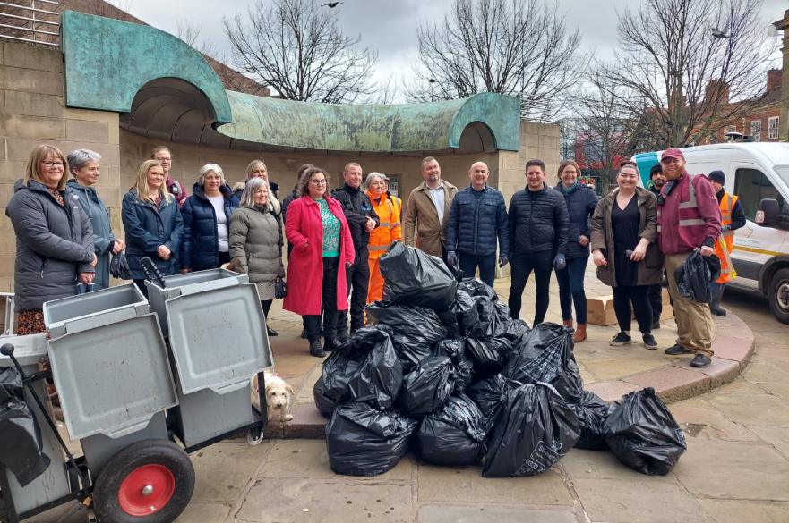 Volunteer litter pickers in Derby Market Place