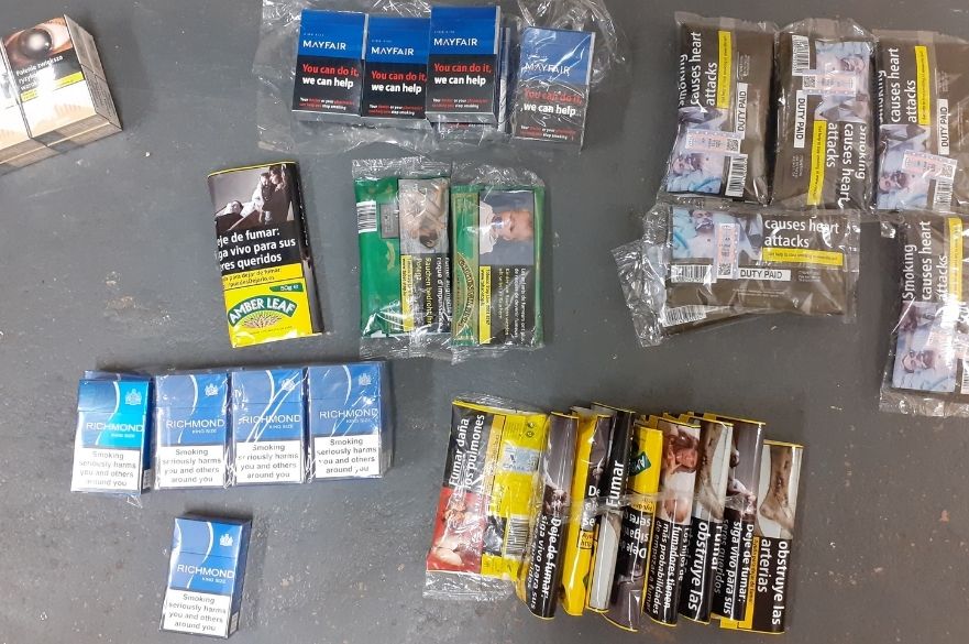 Illicit tobacco and cigarettes on counter