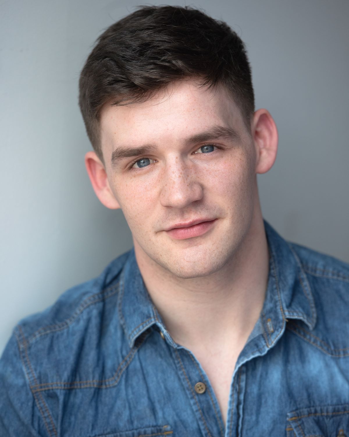 Headshot of actor Ben Tanner