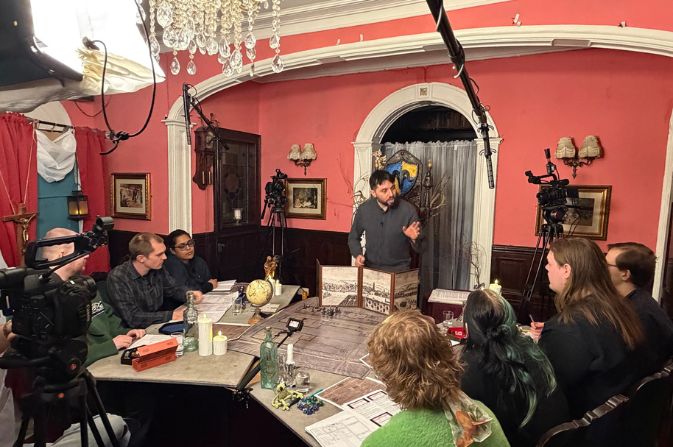group of people playing dungeons and dragons
