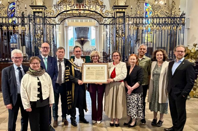 The mayor and Council Leader with the delegation from Osnabruck inside Derby Cathedral