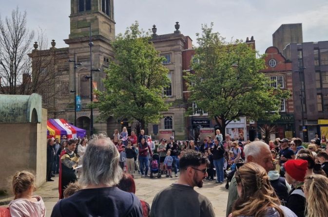 crowds gathered in Derby Market Place for the St George's Day entertainment