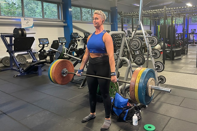 Sam Shaw member at Springwood Leisure Centre lifting weights