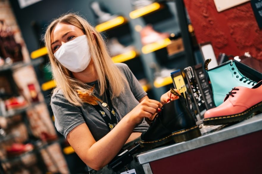 shop worker in mask