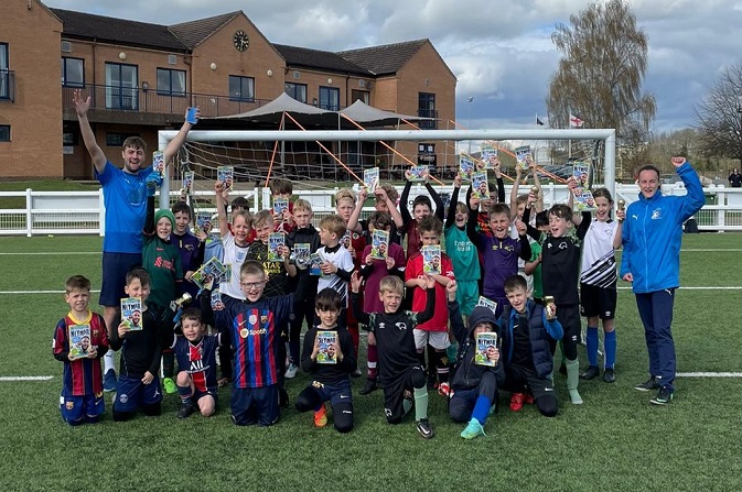 A group of children taking part in a Soccerstars Holiday Activity and Food session