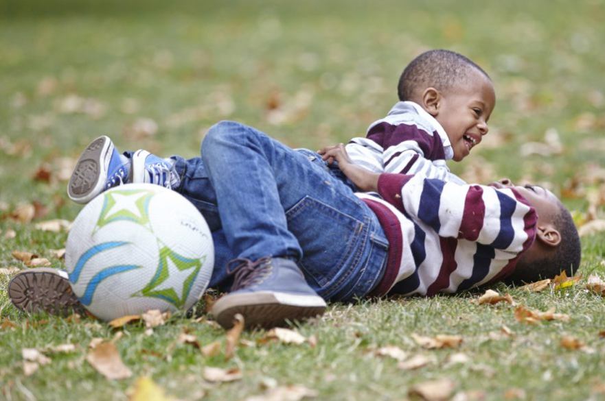 Children playing with football