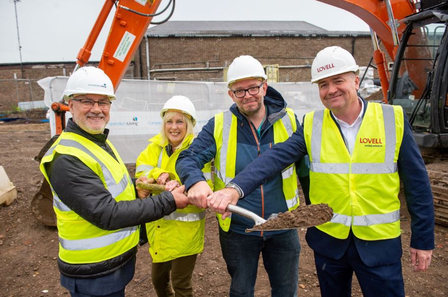 From left to right: Bruce Lister, T Jones, Councillor Steve Hassall and Tim Mansell in high vis jackets at construction site.