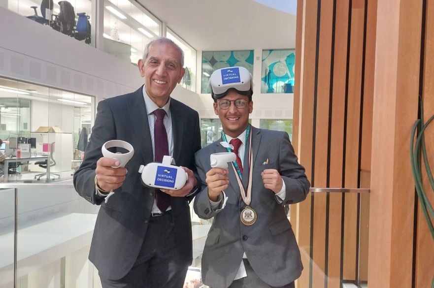 Councillor Hardyal Dhindsa and the Youth Mayor, Muhammad Muntasir, with the VR headsets funded by the Home Office Safer Streets 4 programme.