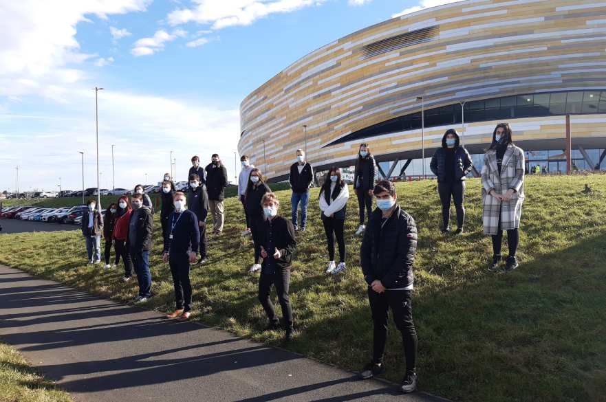 college students at Derby Arena vaccination centre