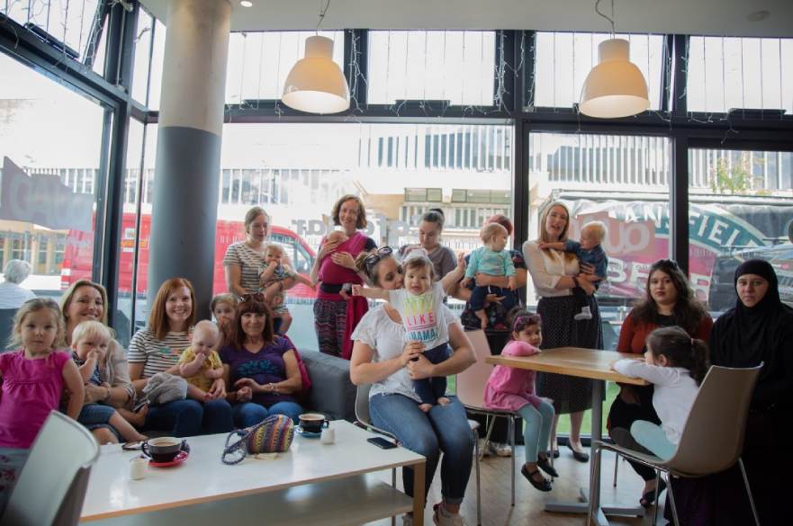 Parents with children in cafe