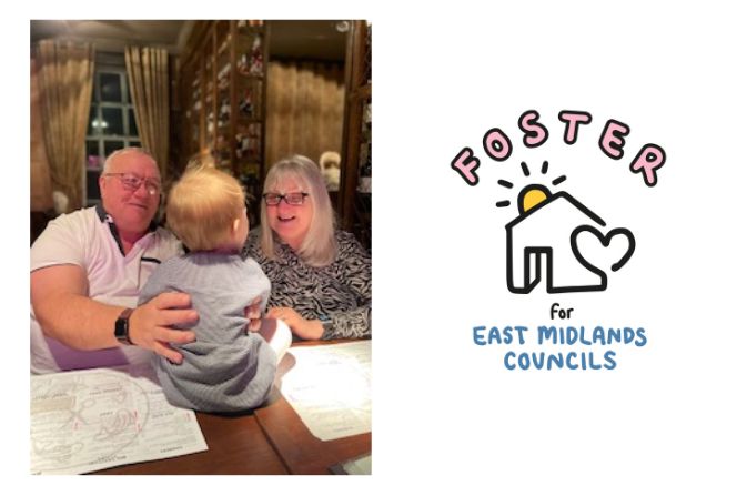 Ruth and Phil with a child