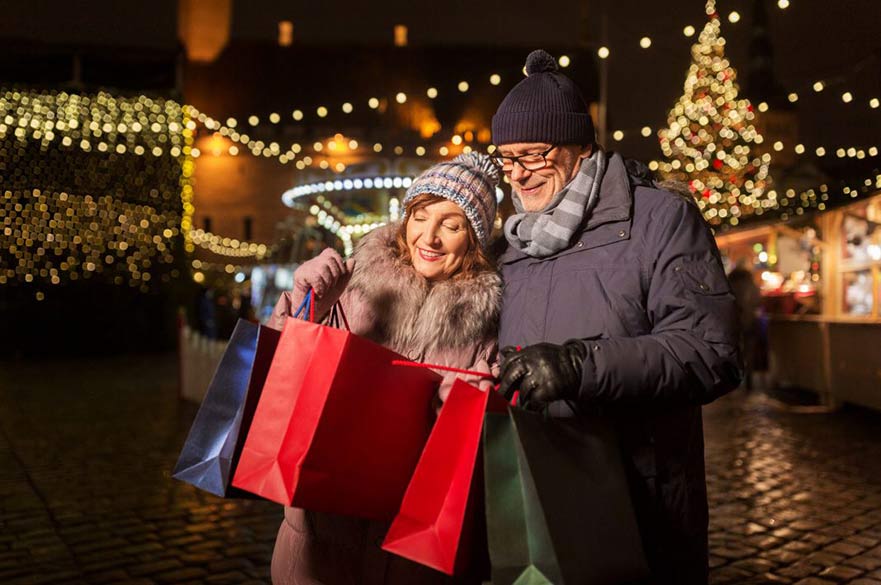 People carrying xmas presents