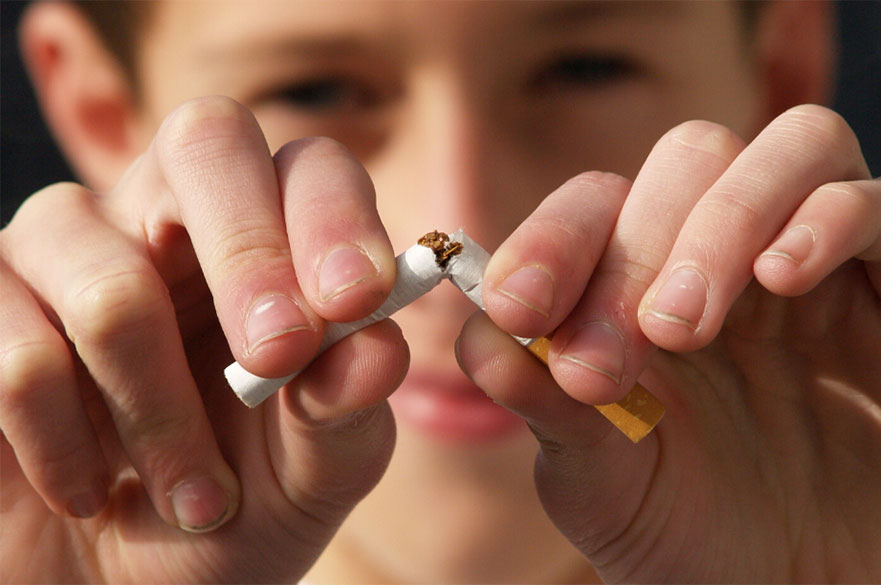 Smoker snapping cigarette