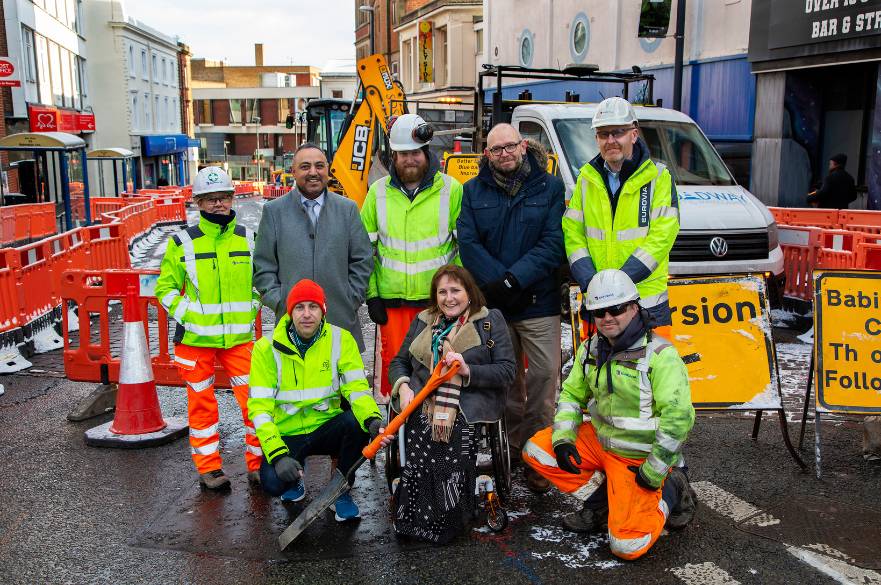 Representatives from Derby City Council and Eurovia posing with spade.