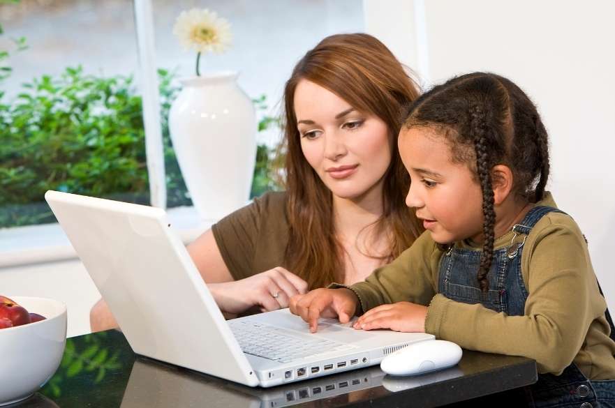 woman and child and laptop