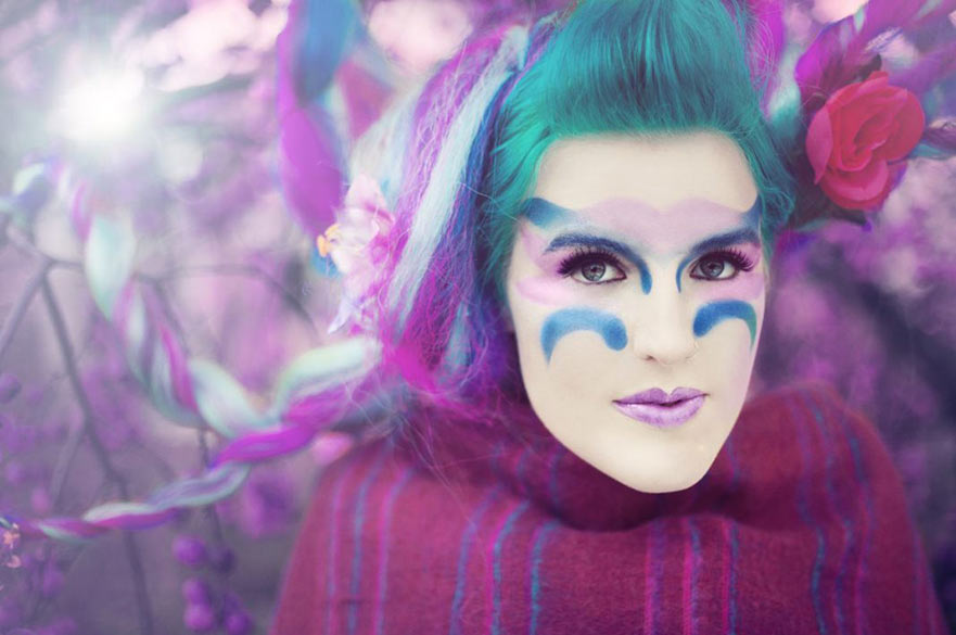 Woman wearing purple makeup