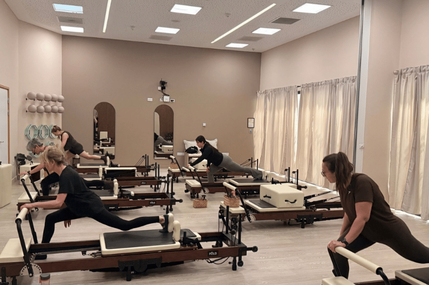 Women taking part in a reformer class at Derby Arena.
