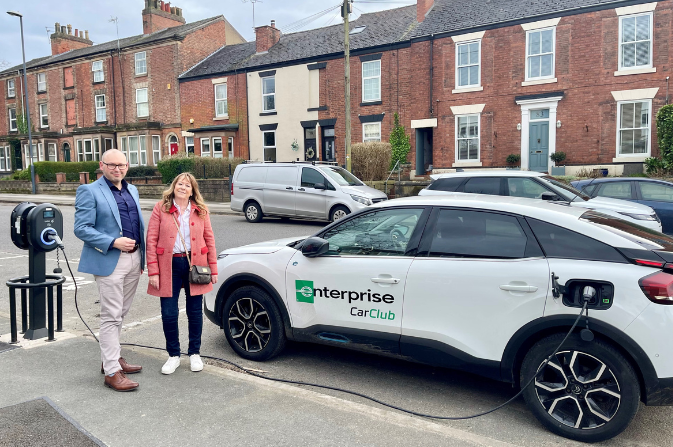 Cllr Swan and Storm Baines in front of a car club car