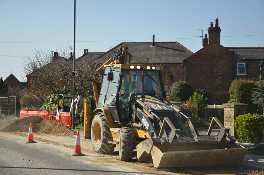 Digger at roadworks