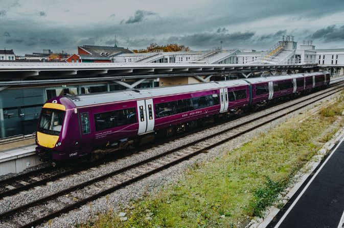 A train at a platform at a train station.