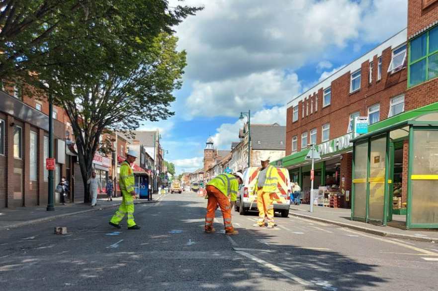 Workmen repairing Normanton Road