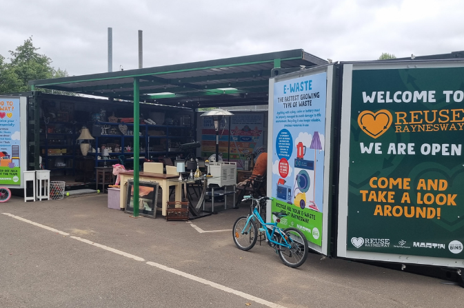 The images shows the Reuse Raynesway shop from an external view.